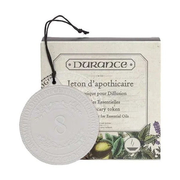 ceramic apothecary token on white background