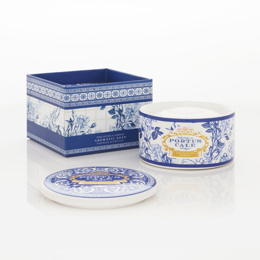 Ceramic container with lid and decorative box featuring 'Portus Cale' branding on a white background.